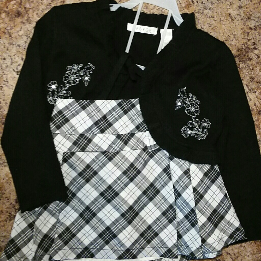 George black shrug and plaid skirt
